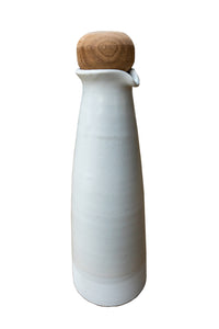 White carafe with wooden stopper