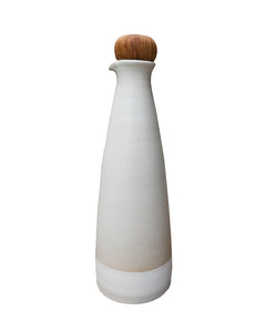 White carafe with wooden stopper